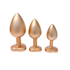 Gleaming Love Pearl Gold Butt Plug Set | Front View | "Luxury gold-toned plug set - complete collection"