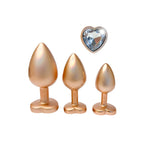 Gleaming Love Pearl Gold Butt Plug Set | Detail View | "Luxury gold-toned plug set - material finish"