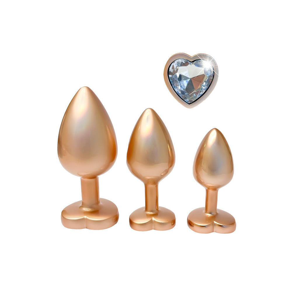 Gleaming Love Pearl Gold Butt Plug Set | Detail View | "Luxury gold-toned plug set - material finish"