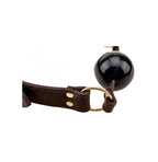 BOUND Nubuck Leather Solid Ball Gag | Side View | Ball gag showing strap adjustment